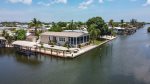 GORGEOUS 3/2 ON WATER HOME WITH A BOAT LIFT!