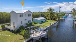 2/2 IN BOKEELIA WITH AMAZING GULF ACCESS! BOAT LIFT INCLUDED! 