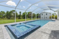 RENTAL READY! Gorgeous Off Water 3/2 with POOL in the Heart of Pine Island! 