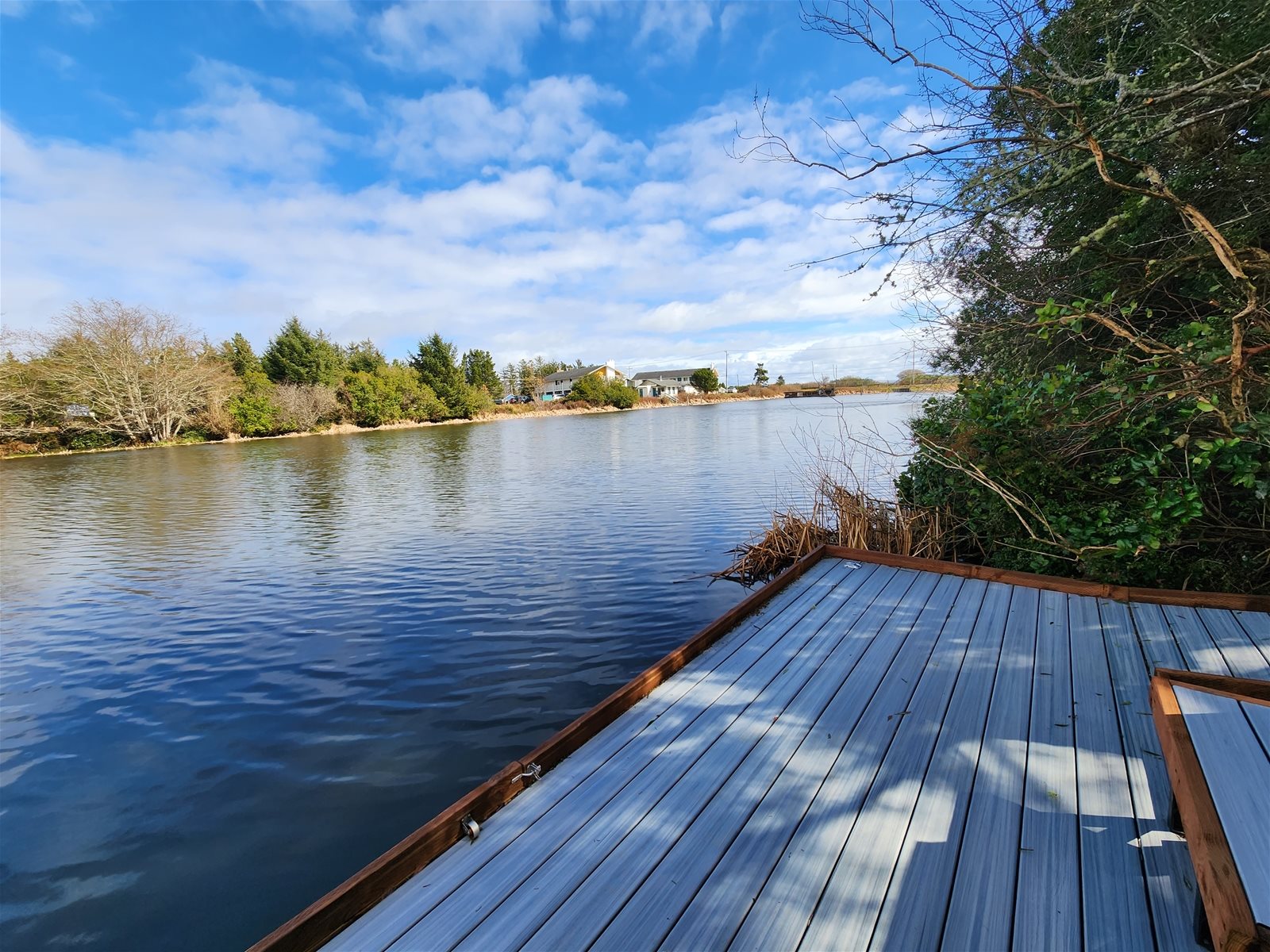 Guest room with a queen size bed and smart TV
