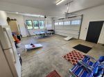 Ping pong and cornhole in the garage