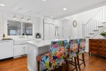 Gorgeous eat-in kitchen is fully stocked with all the amenities 