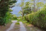 Glimpses of the harbor from the driveway 