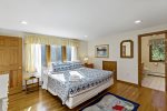 Upstairs primary bedroom with a king bed