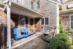 Cozy covered porch and a Weber grill right off the kitchen