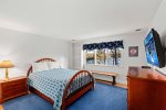 Second upstairs bedroom with a queen bed 