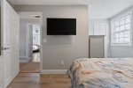 Wall mounted TVs in each bedroom