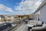 Spacious back deck perfect for grilling a meal with friends and family