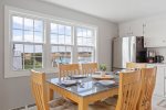 Dining table in the kitchen with water views