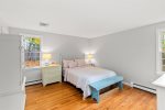 Primary bedroom with a queen bed