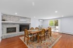 A large dining room with direct access to the back deck