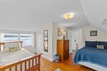 Upstairs bedroom with two queen beds and a view