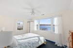 Wake up to an ocean view in the primary bedroom