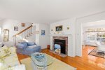 The dining room opens up to the adorable sitting room