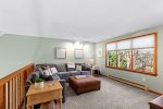 Upstairs living room with a cozy sectional