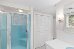 Standup shower and ample closet space