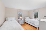 Second main level bedroom with two twin beds