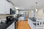 Enjoy a fully stocked kitchen with stainless steel appliances