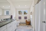 en-suite Full bathroom, double sink and walk in shower for Primary bed
