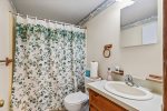 Full bathroom with a tub and shower