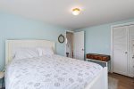 Second bedroom with queen bed located on main level