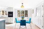 Additional dining seating for 4 with marsh/water views