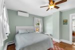 Enjoy a restful night in this Cape Cod vacation rental bedroom with climate-controlled comfort