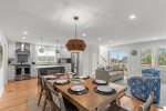 Dining space with seating for the whole family, opening directly to the deck.