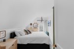 The third upstairs bedroom embraces a nautical theme, echoing Provincetowns maritime spirit.