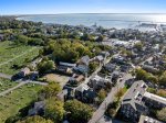 A stunning aerial view of this Provincetown vacation rental overlooking the harbor and downtown. You can see MacMillan Pier and bustling Commercial Street just moments away.