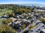 Another beautiful aerial shot showcasing the homes prime Provincetown location near the harbor and downtown. Book your Cape Cod getaway today