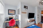 Charming workspace nook with a desk and chairideal for remote work, checking emails, or planning your next Provincetown adventure.