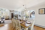 Dining area with natural light and views, relaxed meals and easy conversation in this Eastham summer rental.