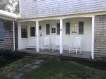 Front porch with rocking chairs, great for enjoying a cup of coffee in the morning