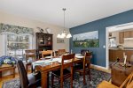 Formal dining room seats eight for seafood feasts, family celebrations, and easy takeout nights after the beach.
