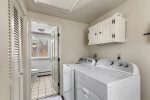 Convenient first floor laundry area with washer and dryer, making it easy to refresh clothes and beach towels. 