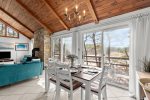 Dine with a view in this bright South Wellfleet retreat, where oversized sliders frame the surrounding marsh landscape.