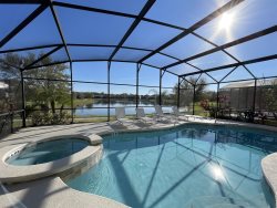 372  Welcome to Lightwater Villa, your modern 4 bed Disney vacation home!  South-facing pool & spa overlooking lake