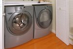 Full size washer and dryer within condo