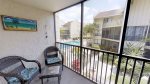 Screened lanai voerlooking swimming pool