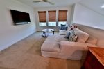 Upper Floor Loft with Wall Mounted Large Screen TV