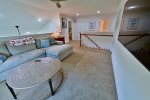 Upper Floor Loft with Wall Mounted Large Screen TV