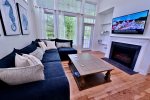 Family Room with Wall Mounted Large Screen TV