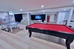 Entertainment Room on Bottom Floor w Huge HDTV, Pool Table, Ping Pong, Roulette and Much More