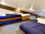 Loft with queen bed and two twin beds
