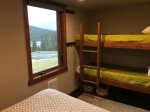 Bunk beds in bedroom with view of Nordic area and Leech lake