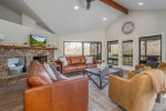 Living Area with Television and Gas Log Fireplace