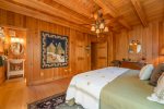 Main Level Primary Bedroom with King-Sized Bed and Ensuite Bathroom