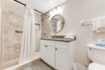 Spacious bathroom with gorgeous new tile shower