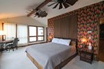 Primary bedroom with a king-size bed.